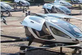 China startup unveils electric “flying taxi” at import expo