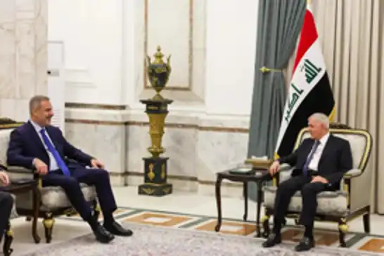 وزير الخارجية التركي  فيدان يلتقي الرئيس العراقي عبد اللطيف رشيد في بغداد