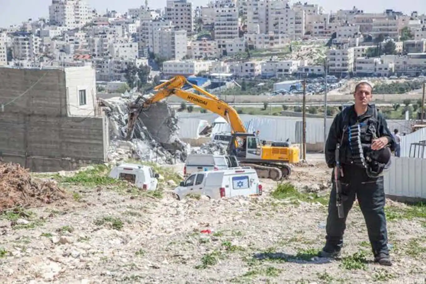 Israeli forces demolish two Palestinian homes near Jerusalem, displacing dozens