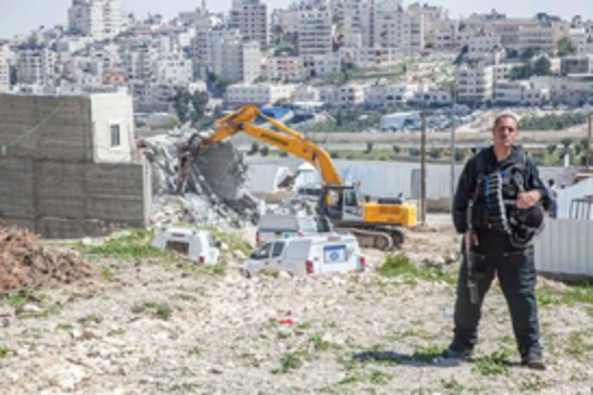 Israeli forces demolish two Palestinian homes near Jerusalem, displacing dozens