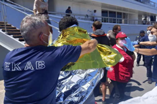 At least 18 migrants drown after boat capsizes off Greek island of Crete