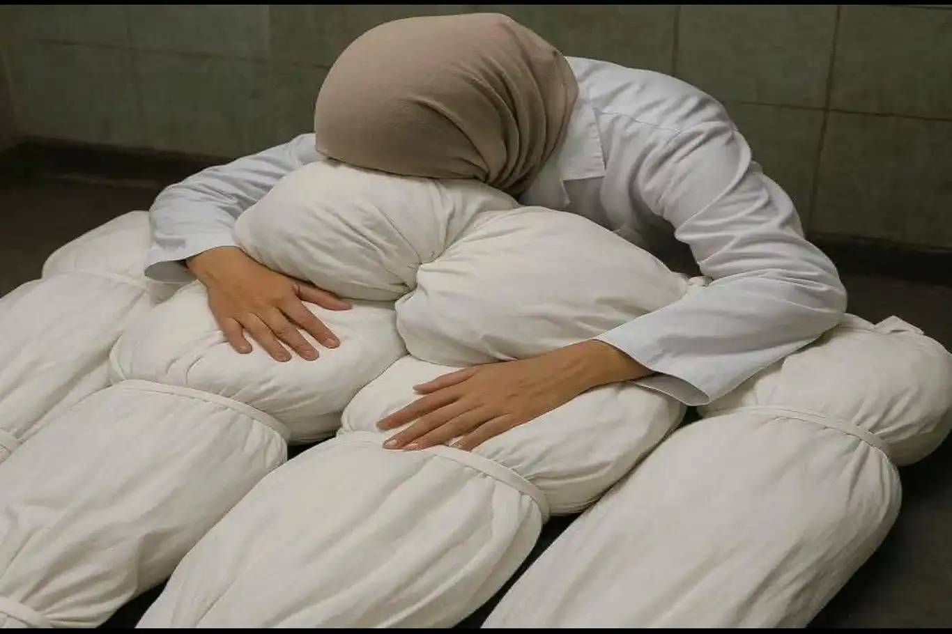 9 çocuğu katledilen anne… 9 çocuğu katledilen anne…