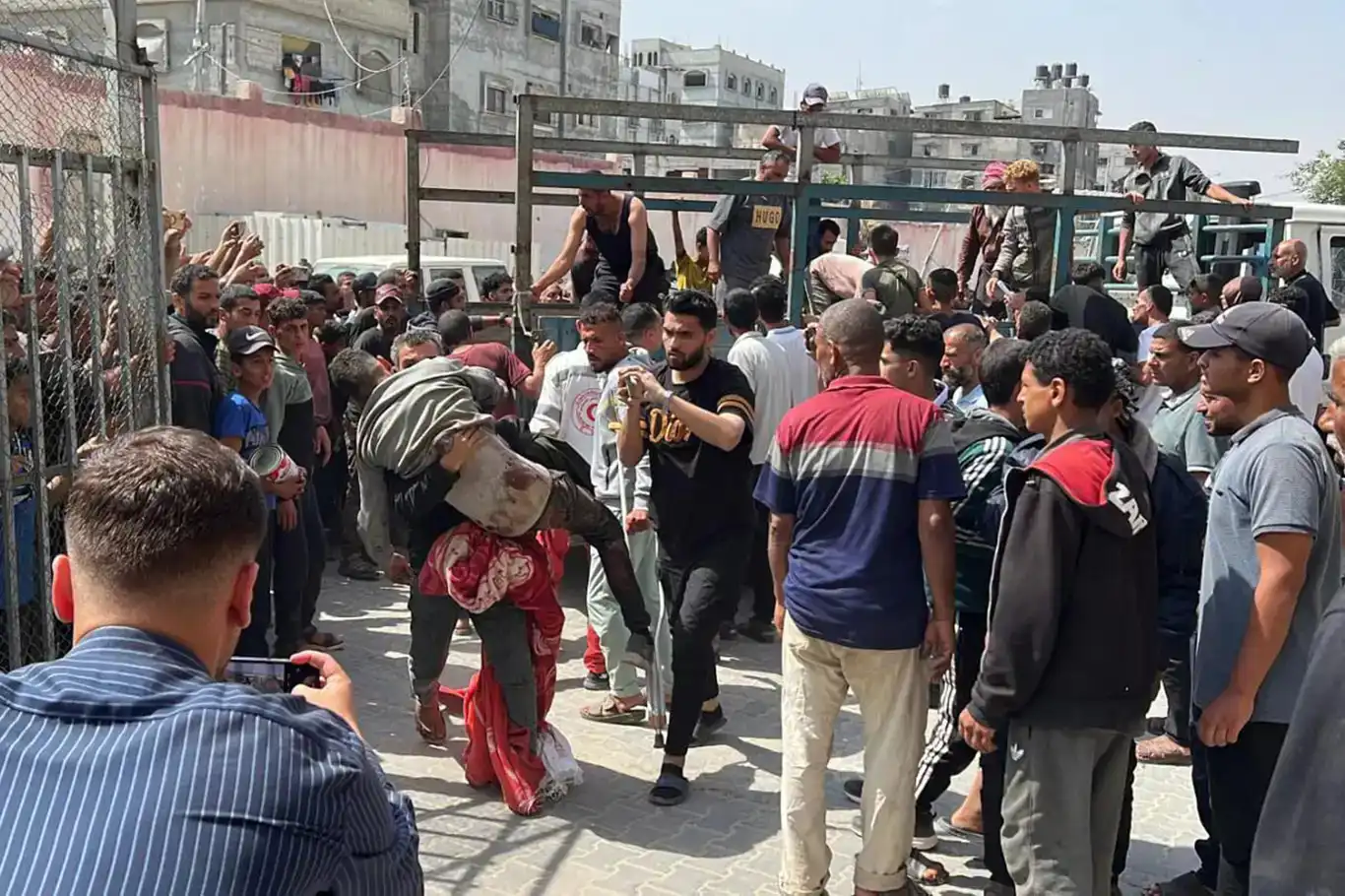 Five killed, over 70 wounded as Israel attacks Palestinians seeking aid in Gaza Five killed, over 70 wounded as Israel attacks Palestinians seeking aid in Gaza
