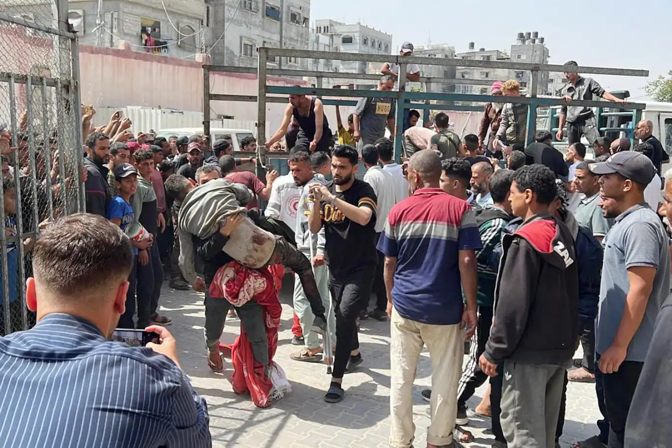 Israeli troops massacre Palestinians waiting for aid in Gaza Israeli troops massacre Palestinians waiting for aid in Gaza