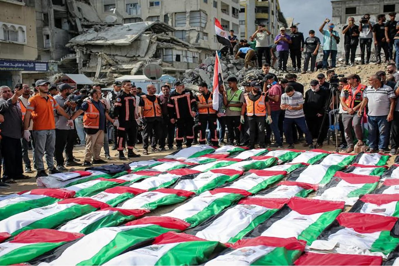 Hundreds attend funeral for 105 Palestinians recovered from destroyed buildings in Gaza