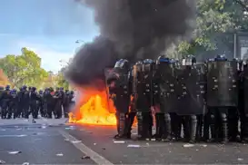 Over 1,300 injured, 8,000 detained in France student protests