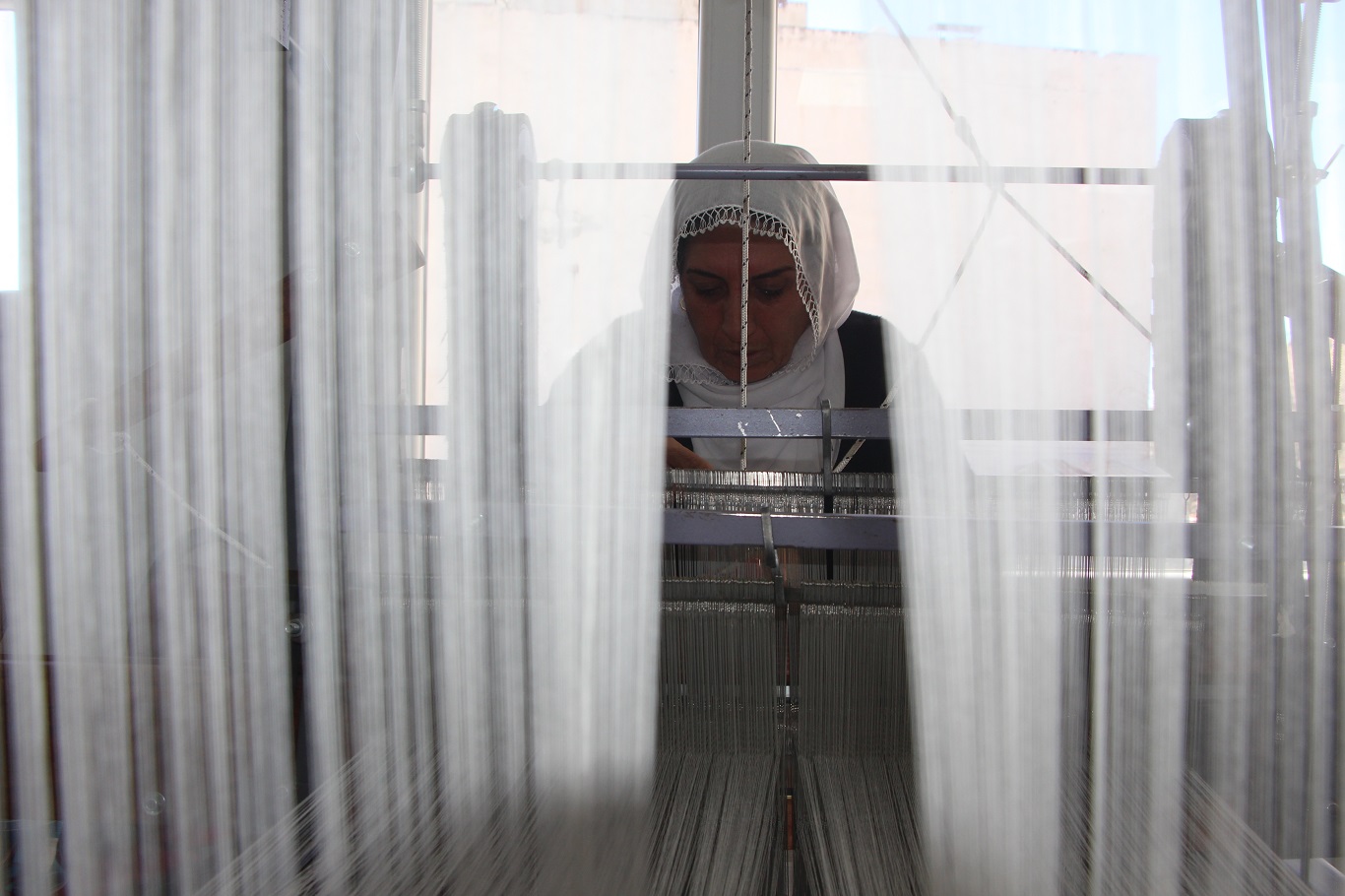 Bin yıllık geçmişe sahip Mardin’e özgü buhari kumaşı ilmek ilmek dokunuyor