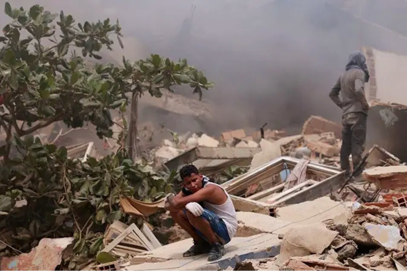 Rescuers race to find Venezuela earthquake victims as death toll hits 235