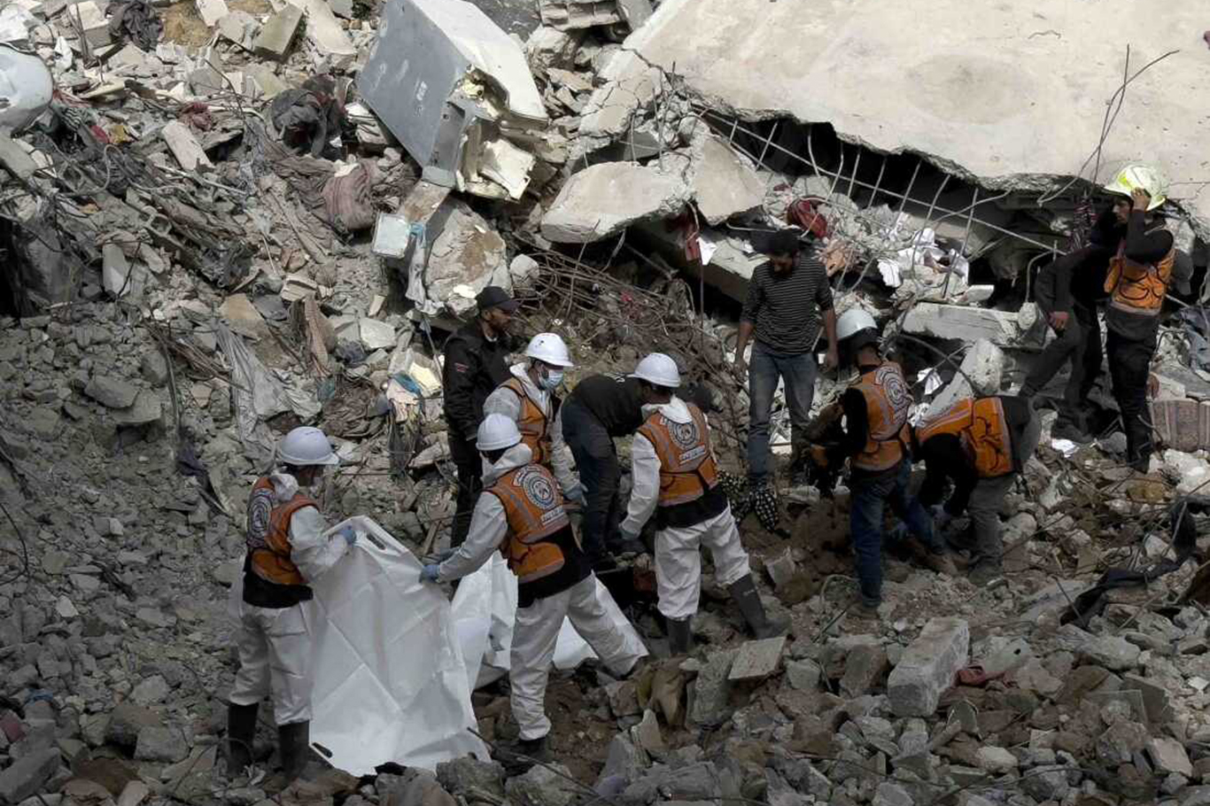 Remains of 12 Palestinians recovered from rubble of bombed home in Gaza
