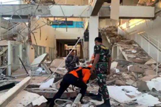 Indonesia earthquake death toll rises to 51 as rescue teams battle landslides