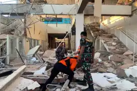 Indonesia earthquake death toll rises to 51 as rescue teams battle landslides