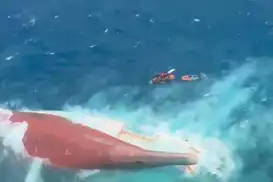 Search enters third day for 129 missing after Indonesia ferry capsizes